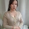 Біло-золотистий браслет з бісеру