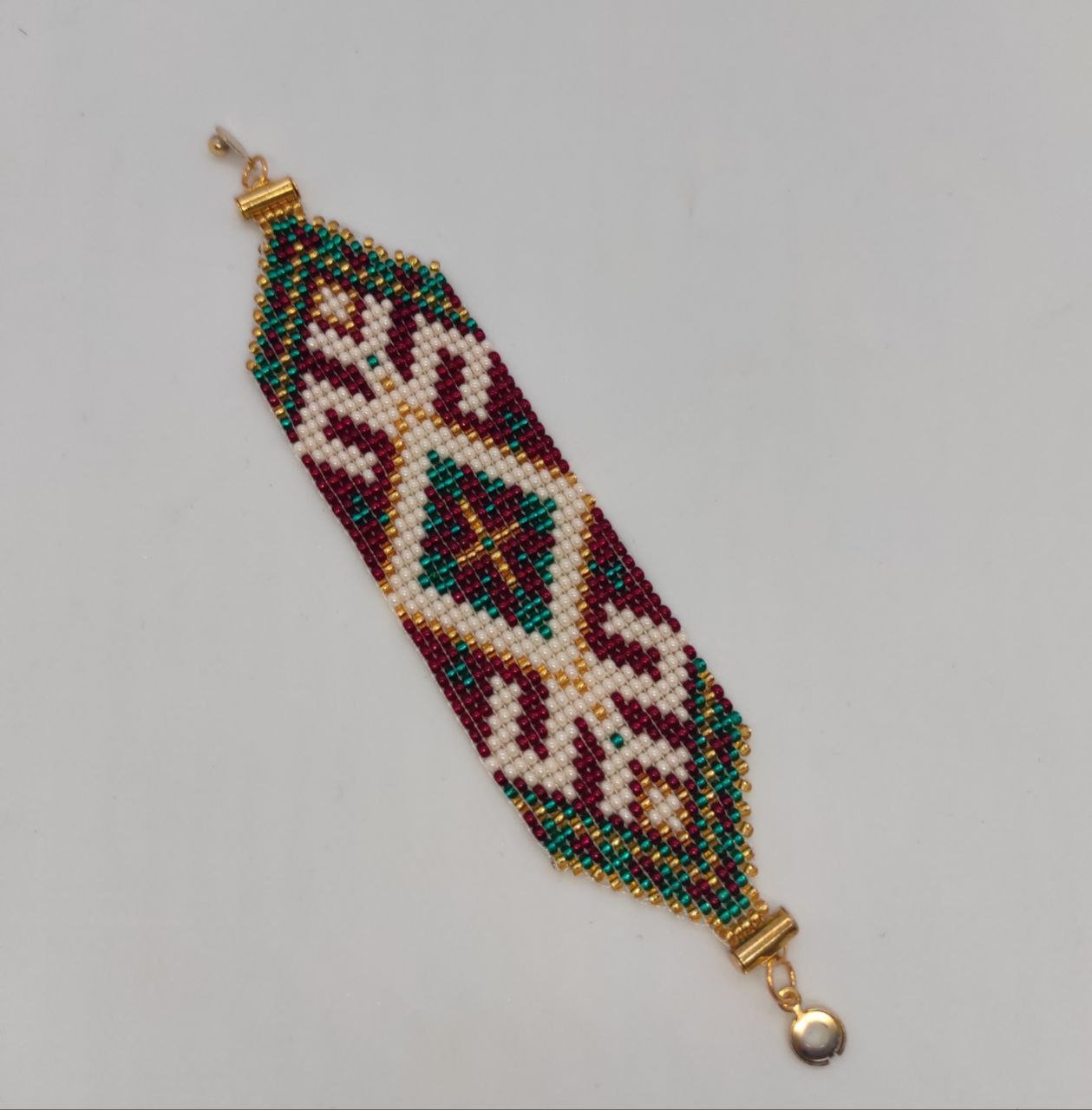 Бісерний браслет “Майя” в зеленому, червоному та золотистому кольорі