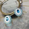 Сережки “Анна” у білому кольорі з блакитною стразою